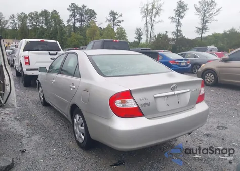 2004 Toyota Camry Le z USA, uszkodzony, nr VIN 4T1BE32KX4U842784